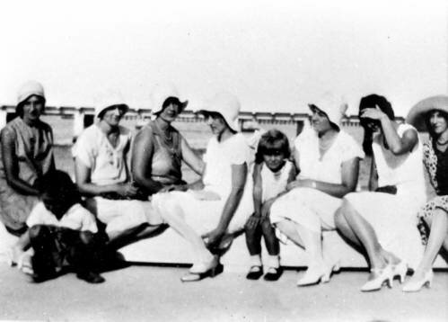 Ladies in their summer beach costumes at the home of J.R. Wood.