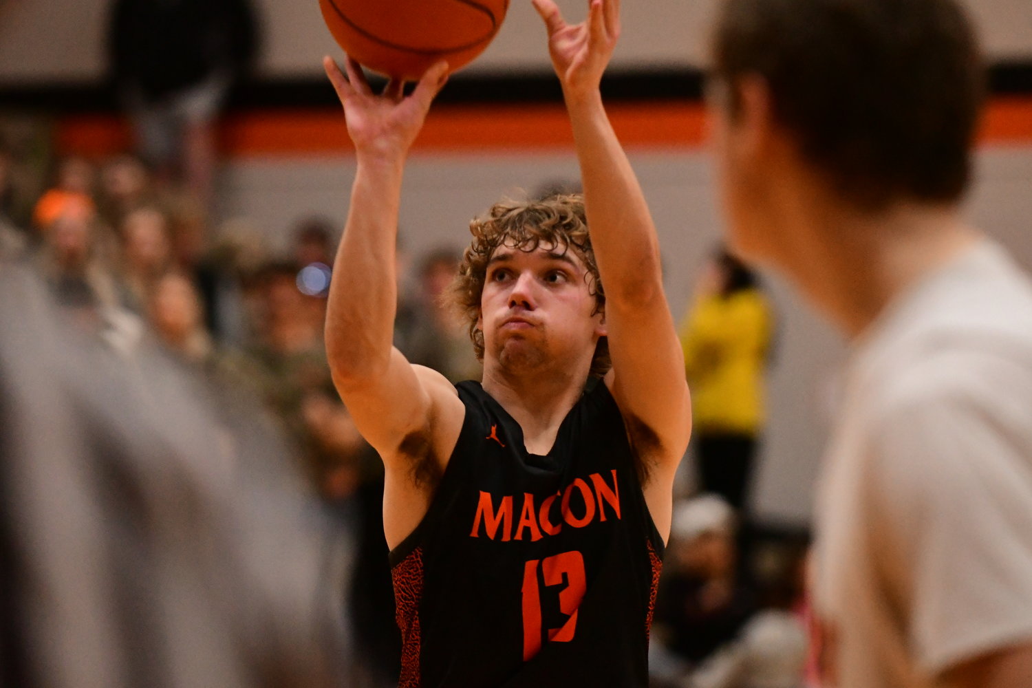 Action from Tuesday's boys basketball game between Kirksville and Macon.