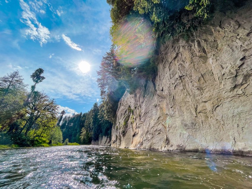 The sun shines down on a rock face along the Chehalis River near Pe Ell on Saturday.
