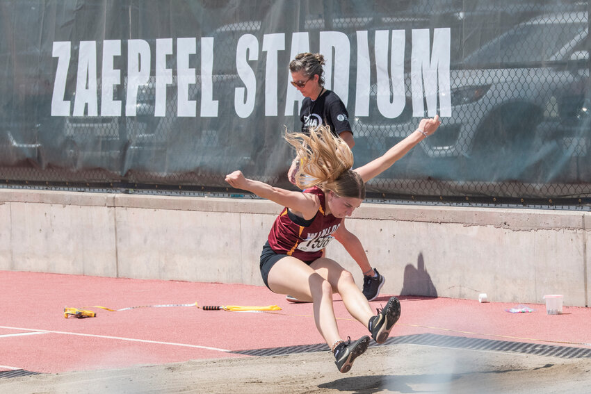 Winlock’s Cali Scofield competes in the long jump event during the 1A/2B/1B State track and field meet in Yakima on Saturday, May 27.