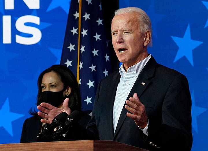 Democratic presidential nominee Joe Biden speaks while flanked by vice presidential nominee, Sen. Kamala Harris (D-California), at The Queen theater on Thursday, Nov. 5, 2020 in Wilmington, Delaware. Biden attended internal meetings with staff as votes are still being counted in his tight race against incumbent U.S. President Donald Trump, which remains too close to call. (Drew Angerer/Getty Images/TNS)