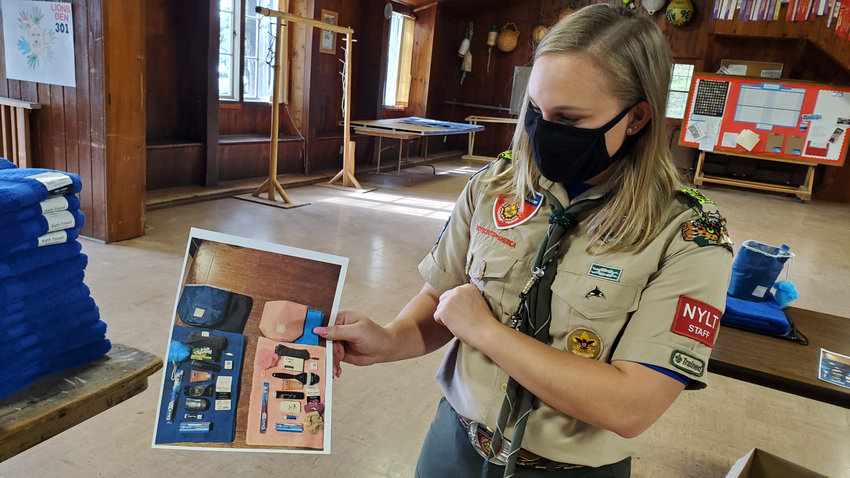 Melba Eagle Scout builds new trophy cases for high school