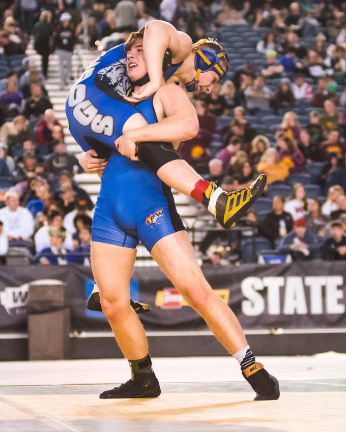 Adna's Lucas Ashley prepares to slam an opponent during Mat Classic XXXII on Feb. 22, 2020 at the Tacoma Dome.