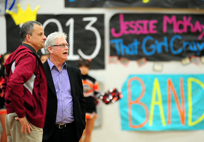 W.F. West head coach Henri Weeks, left, talks with Centralia head coach Tom Kelly prior to the start of an Evergreen 2A Conference girls basketball game at W.F. West in 2013. Kelly, after a year off from the prep game, was hired on Thursday to replace Weeks as W.F. West's head coach. Weeks resigned in May.&nbsp;