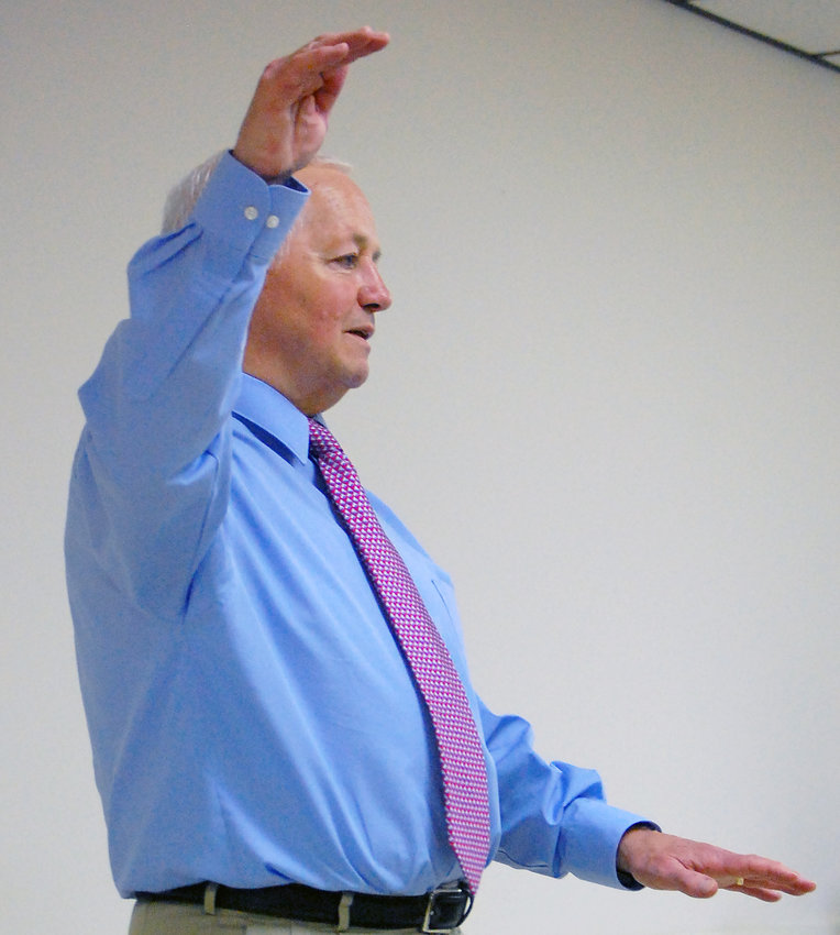 State Insurance Commissioner Mike Kreidler speaks to a group of Lewis County Democrats in September 2013 in Centralia.