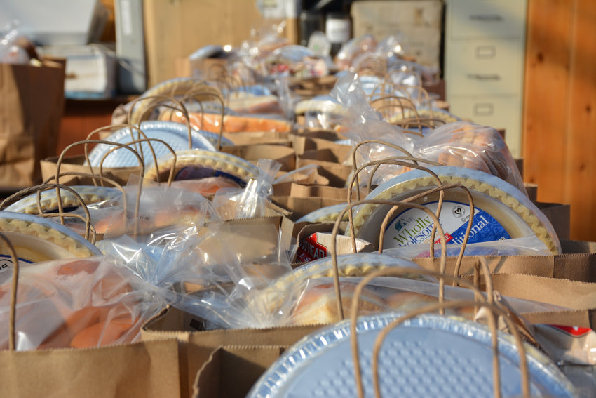 A line of turkey dinners sit ready to be gifted to family members in this file photo.