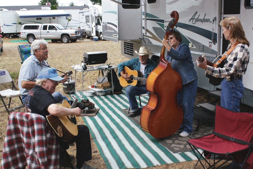 Bluegrass enthusiasts gather during the week leading up to Rainier Round-Up Days. This year's Rainier Bluegrass Festival is Friday, Aug. 25.