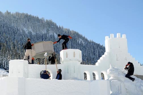 Volunteers help to construct a two-story ice castle for the Winter Carnival at White Pass in this 2010 Chronicle file photo.