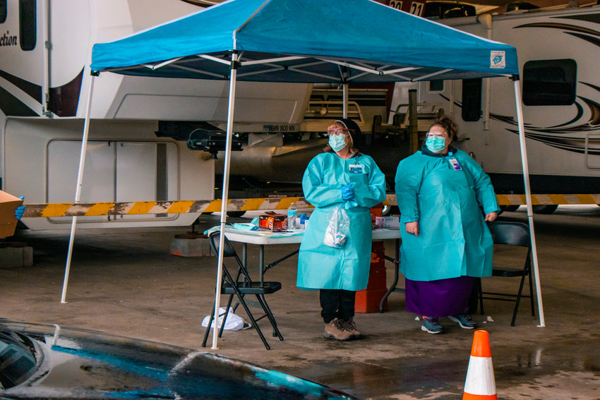 Caregivers from Providence Southwest were joined by medical assistant students from Centralia College during a drive-up COVID-19 vaccine event at the Southwest Washington Fairgrounds in 2021.