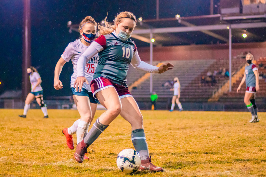 FILE PHOTO: Bearcat&rsquo;s Lauren Tornow (10) takes control of the ball during a game in Chehalis.
