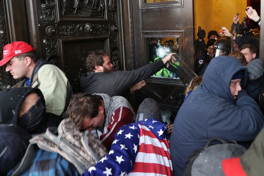 A  pro-Trump mob at the door of the U.S. Capitol Building on Jan. 6 in Washington, D.C. during a riot.