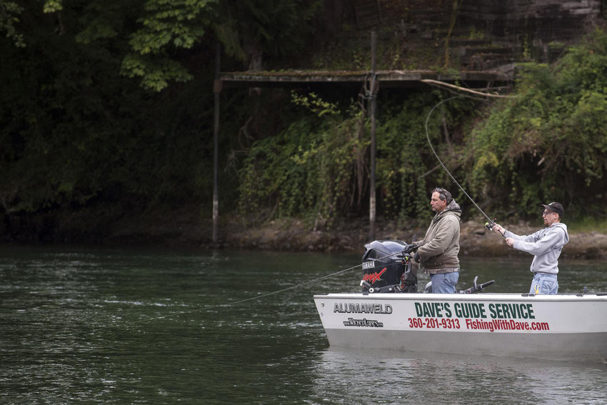 Anglers fish for steelhead from a boat on the Cowlitz River in this 2016 file photo.
