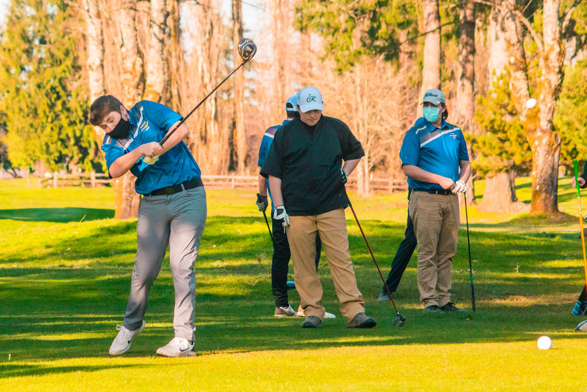 FILE PHOTO - Rochester&rsquo;s Hyde Parrish tees off at Riverside Golf Course on Wednesday in Chehalis.