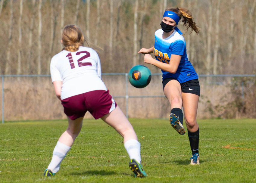 Adna's Gracie Beaulieu boots the ball past a Stevenson defender at home Saturday in the opening round of the playoffs.