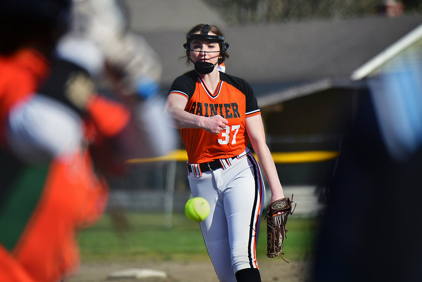 Rainier High School softball pitcher Bailey Elwell delivers a scorcher to a Morton-White Pass High School hitter on Monday, March 29, in Rainier.