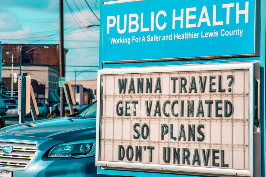 A letterboard in front of the Lewis County Public Health building in downtown Chehalis urges travelers to get vaccinated.