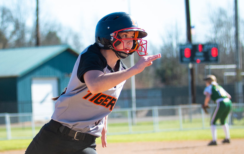 Centralia leadoff batter Ella Orr rounds thirds base and scores in the first inning against Tumwater Monday at Borst Park.