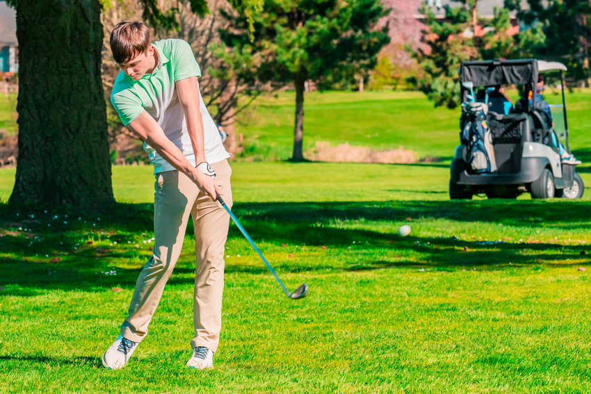 FILE PHOTO - Adna&rsquo;s Chase Collins makes contact at Riverside Golf Course in Chehalis on Monday.
