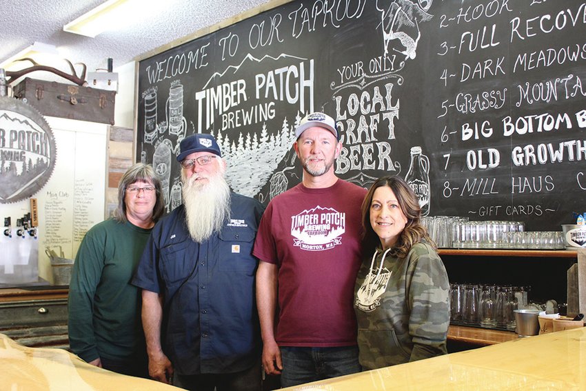 Owners of Timber Patch Brewery &amp; Taproom (left to right) Laurie Judd, Jim Judd, Rich French and Brenda French opened their business one year ago in March.