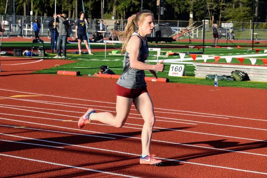 Kelly Robertson ran a leg in the winning 4x100 and 4x200 relays to help the Bearcats capture the team title at the Shelton Invite on Saturday.