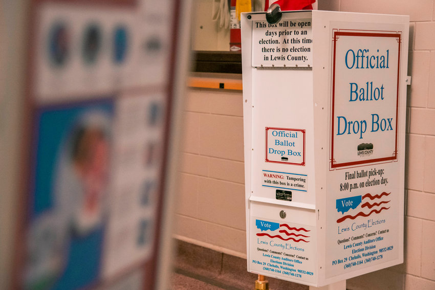 FILE PHOTO &mdash; An official ballot drop box sits locked outside the Lewis County Auditor&rsquo;s Office in Chehalis.