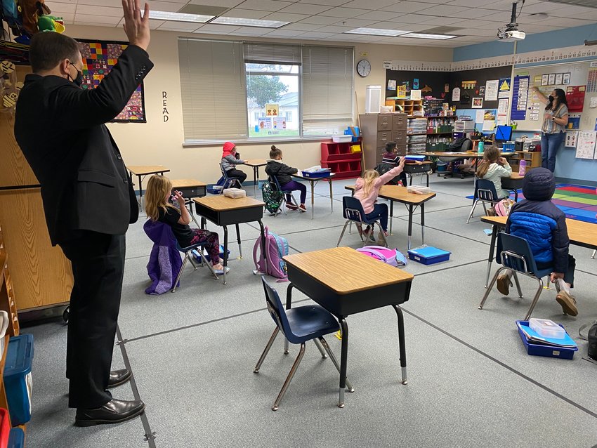 Battle Ground Public Schools Superintendent Mark Ross visits second-grade teacher Katherine Simko&rsquo;s class at Maple Grove Primary School. Battle Ground&rsquo;s K-4 students started hybrid learning this week, with students in fifth through eighth grade slated to return Feb. 22.