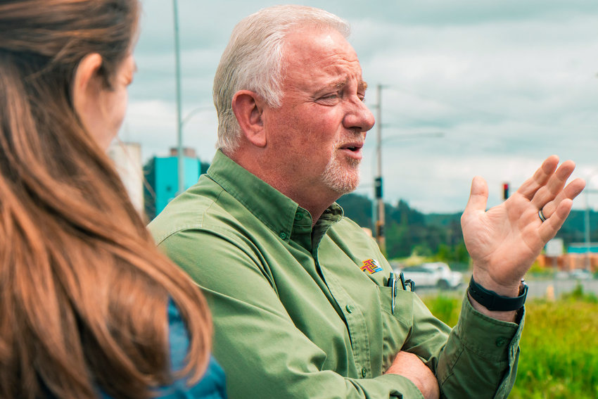 Twin Transit Executive Director Joe Clark discusses plans for a new hydrogen fueling station station near the Bishop Road Twin Transit office in Chehalis earlier this month.