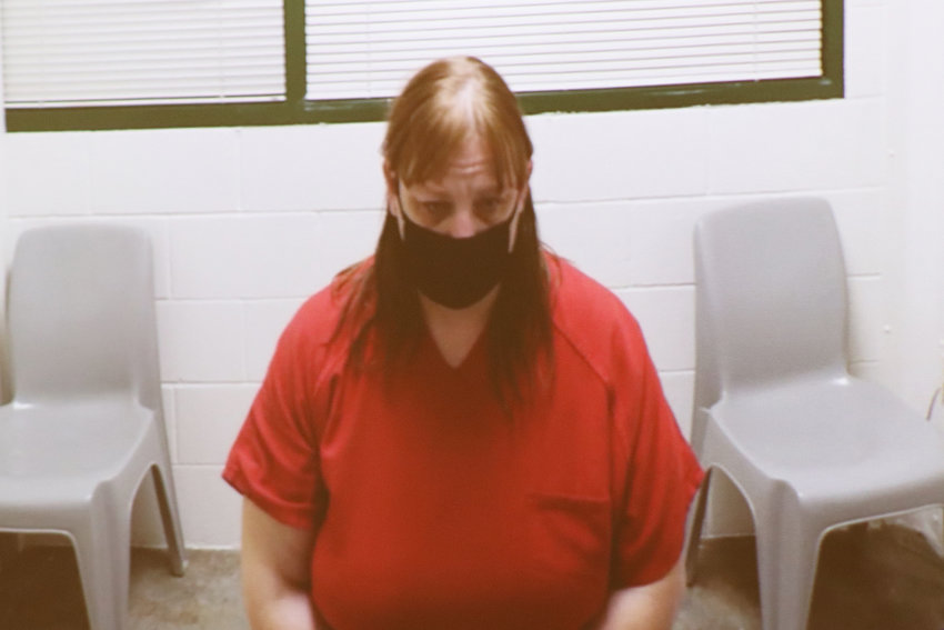 Dawnette Wicks, 42, is accused of grabbing a 12- to 14-inch knife from her vehicle, holding the knife above her head and bringing it down &ldquo;in a stabbing motion&rdquo; while verbally threatening to kill the alleged victim.&nbsp;