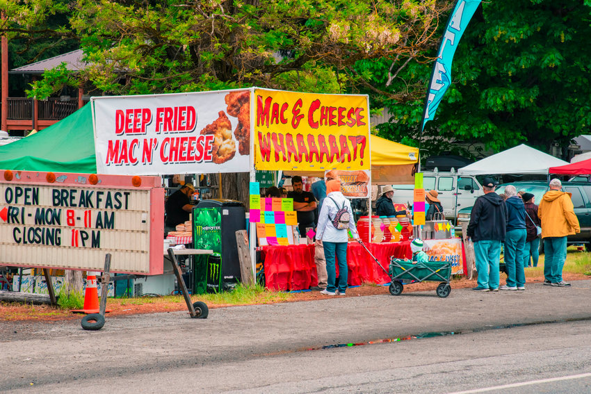 Food is sold and prepared at the Packwood Flea Market in May 2021.