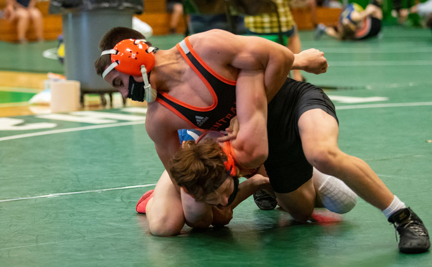 Centralia freshman Antonio Campos prepares to for a first-round pin of a Ridgefield opponent in the opening round of the 120-pound bracket at the 2A District 4 Tournament in 2021.