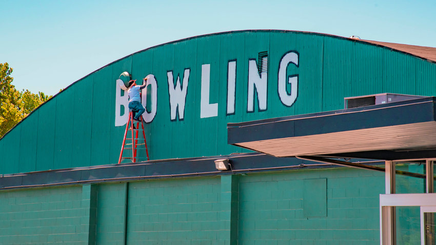 Jared Wenzelburger / jared@chronline.com  The &ldquo;Bowling&rdquo; sign is repainted on Tuesday at the Fairway Lanes bowling alley in Centralia. The business closed amid pandemic restrictions in 2020 and has since been sold. Julie and Jeff Walker now hold the keys to the 62-year-old joint. Last month, they wrote on Facebook that the business would reopen soon.  &ldquo;We are working on getting up and running again soon,&rdquo; they wrote on May 10.  &ldquo;Probably going to be sometime this summer.  We are making some changes and updates and we hope to be fully operational for fall leagues. Registration updates will be posted at a later date. Thanks everyone for their patience and let&rsquo;s get back to bowling.&rdquo;