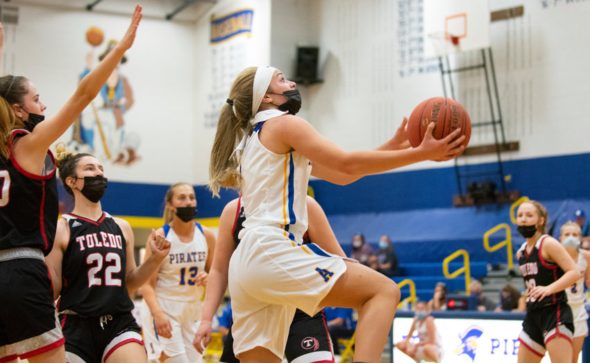 FILE PHOTO - Adna's Kaylin Todds breaks free for an uncontested layup against Toledo on Thursday.