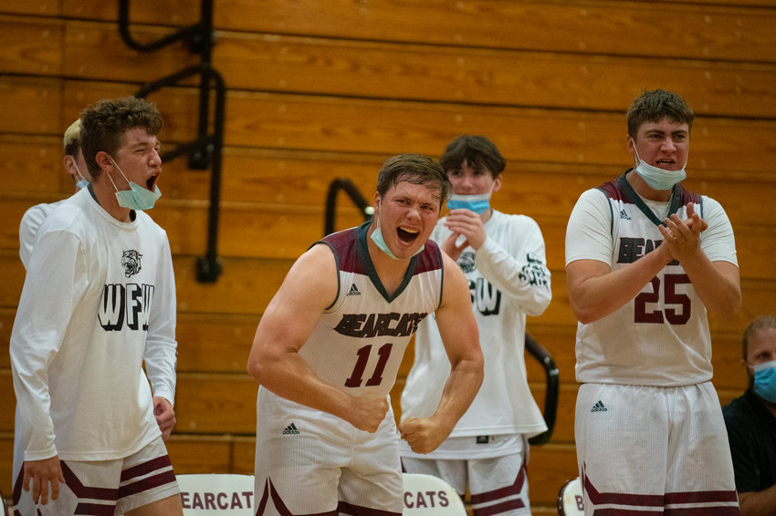 W.F. West players react to a Bearcat bucket during their 59-47 victory over Black Hills Friday to clinch the 2A Evergreen Conference title.