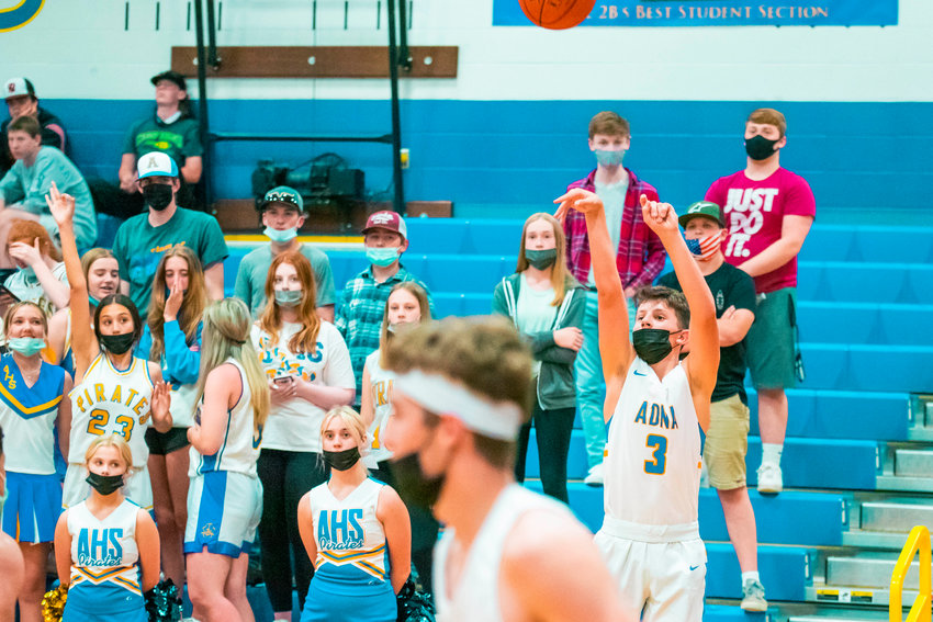 Adna&rsquo;s Braeden Salme (3) makes a three-point shot during a game against Winlock on Friday.