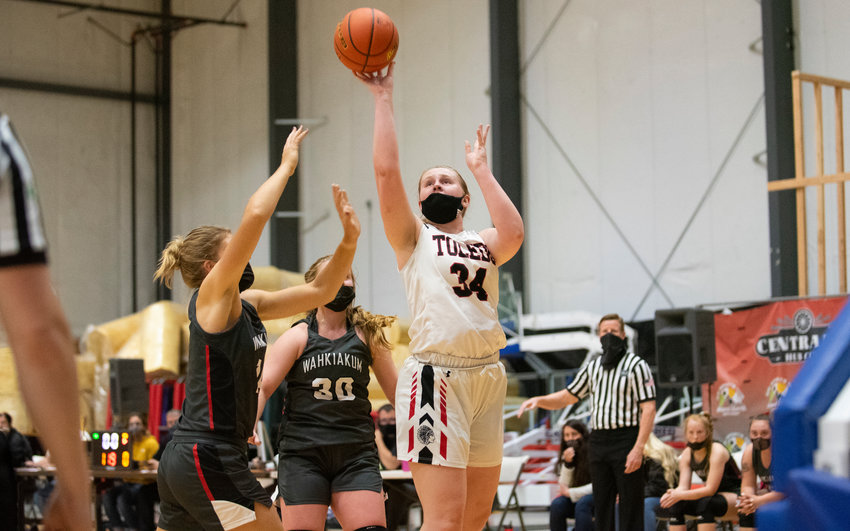 Toledo senior Stacie Spahr puts up a shot against Wahkiakum in the 2B District 4 title game on Thursday at the NW Sports Hub.