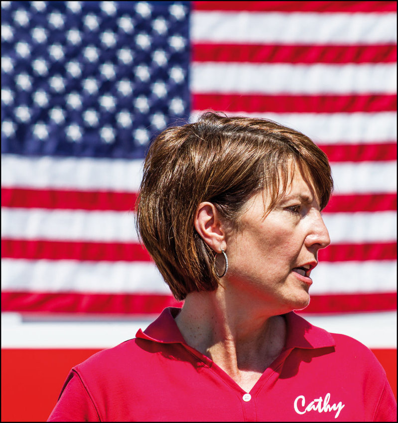 FILE PHOTO &mdash; Rep. Cathy McMorris Rodgers stands in front of an American flag.