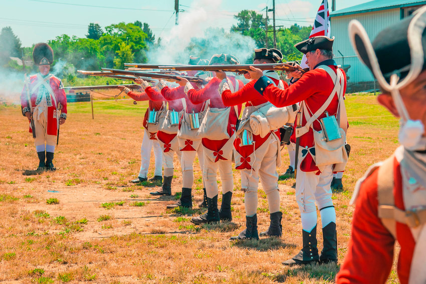 Long rifles were fired during an American Revolutionary War reenactment at the Veterans Memorial Museum for 1776 Day Saturday in Chehalis.