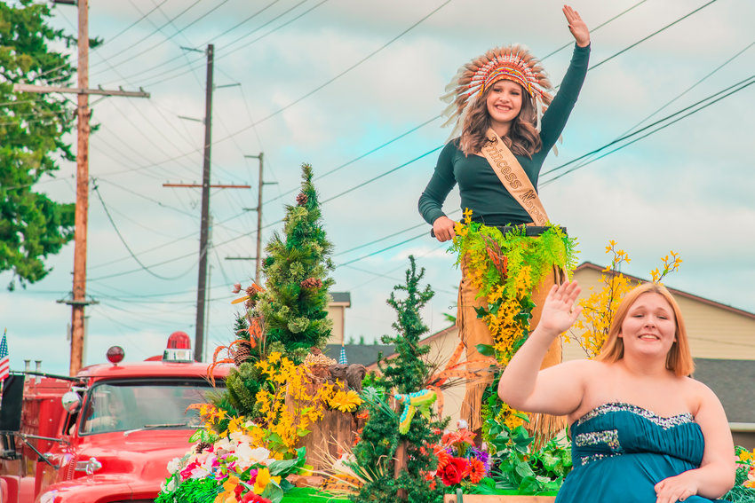 Charlotte Barber, this year&rsquo;s Princess Napawinah, waves from a float during the Napavine Funtime Festival parade Saturday.