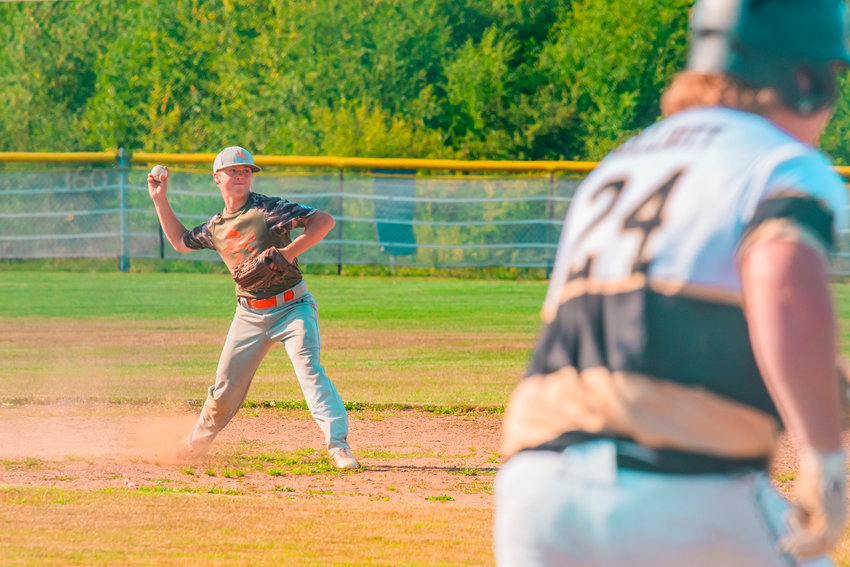Rural Baseball's Jesse Towns makes a throw from second to third base during summer 2021.