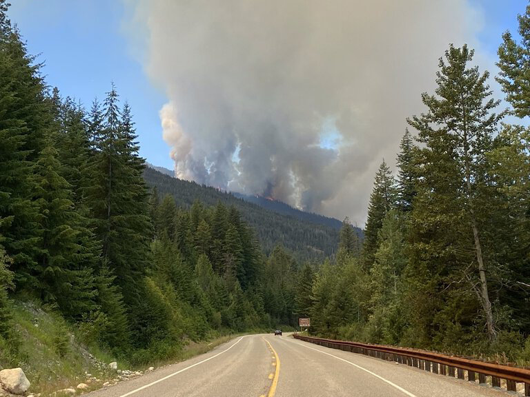 Methow Valley fires forced the closure of a portion of state Route 20, the North Cascades Highway. It&rsquo;s closed from milepost 165 and 185, about 8 miles west of Winthrop. Above, the Cedar Creek Fire is seen from Highway 20 on Monday, July 12, 2021.