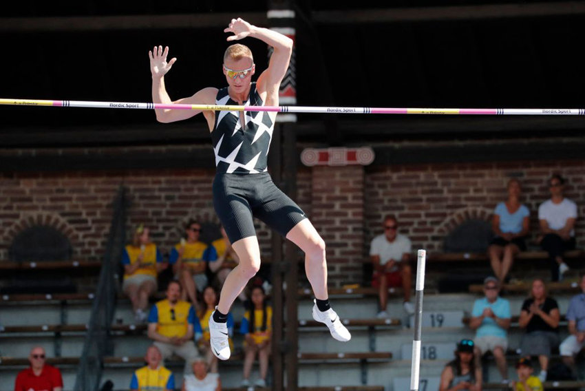 Sam Kendricks of the US competes in the men's final pole vault competition during the Wanda Diamond League Track and Field Championships in Stockholm, Sweden on July 4, 2021. - Two-time world champion Sam Kendricks of the United States took second with 5.92m on countback from 2012 Olympic gold medallist Renaud Lavillenie of France. (Christine Olsson/TT News Agency/AFP via Getty Images/TNS)