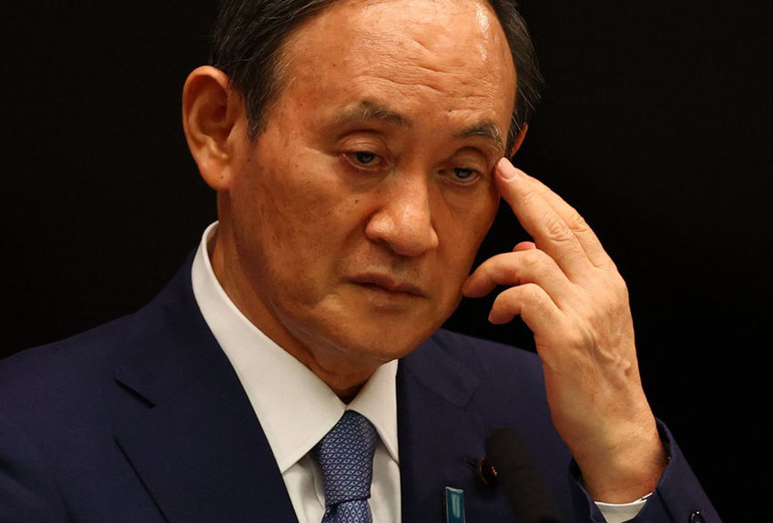 Japan's Prime Minister Yoshihide Suga attends a news conference on Japan's response to the Covid-19 coronavirus pandemic, at his official residence in Tokyo July 30, 2021, in the middle of the Tokyo 2020 Olympic Games. (Issei Kato/Pool/AFP via Getty Images/TNS)