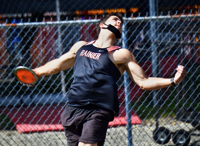 Rainier High School&rsquo;s Jeremiah Nubbe uncorks one of his patented discus throws on April 29, during the WIAA District 4 Track &amp; Field Championships at Rainier High School.