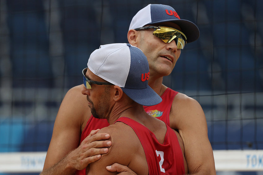 The United States' Philip Dalhausser and Nicholas Lucena (2) react during action against Team Brazil in a Men's Preliminary - Pool D beach volleyball match during the Tokyo 2020 Olympic Games at Shiokaze Park on July 27, 2021 in Tokyo.