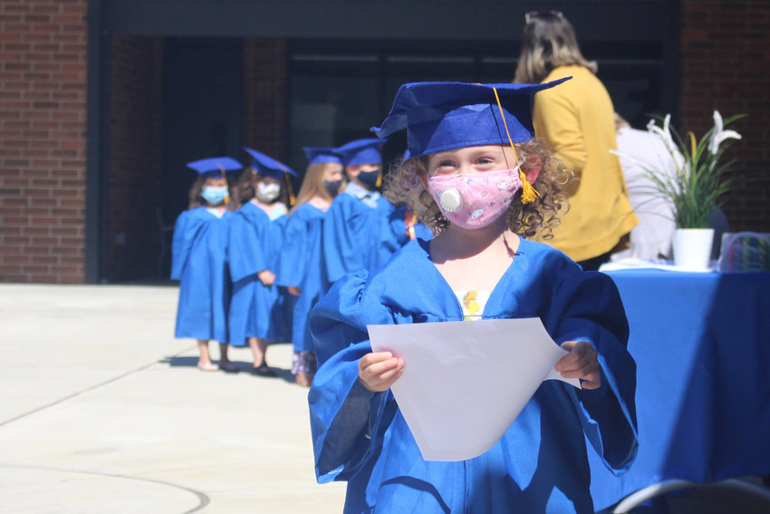 Preschooler Kyli Petrie is pictured graduating from Ridgefield&rsquo;s Early Learning Center.