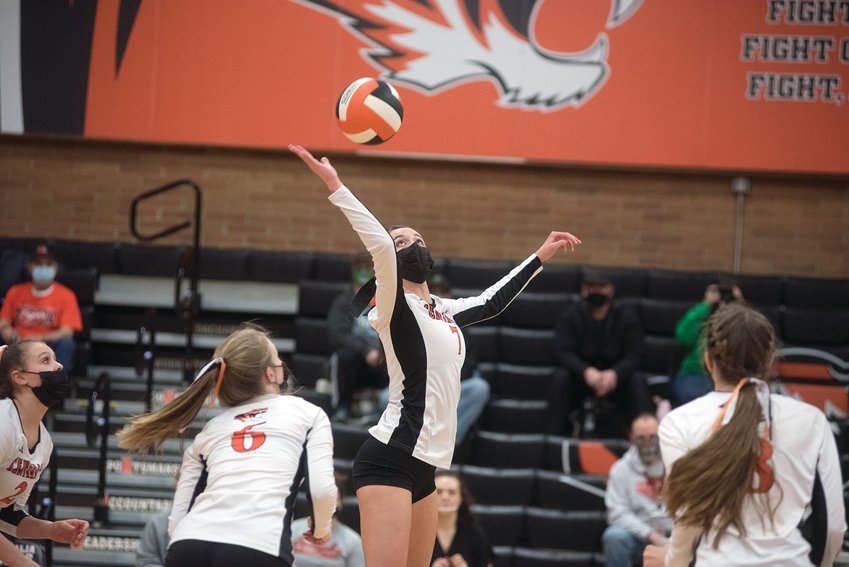 Centralia senior Faith Waterfield rises up to smack the ball against Tumwater in the 2021 season opener in Centralia.