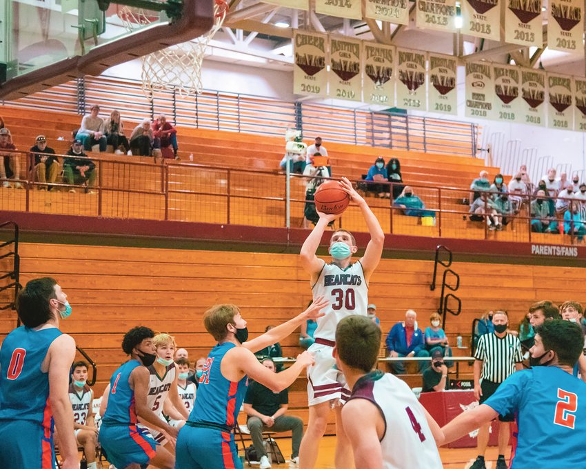 W.F. West's Austin Snyder (30) goes up for a shot during a game Wednesday night.