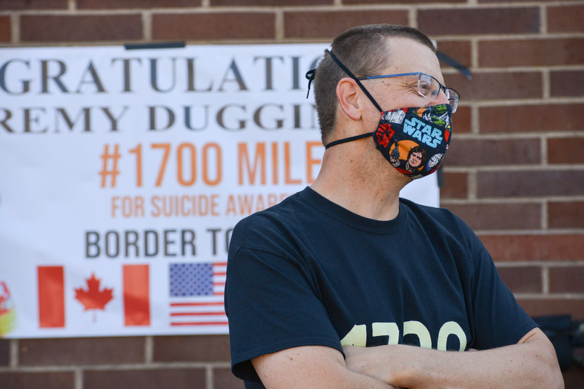 Jeremy Duggins, a third grade teacher in Hockinson, was welcomed home after biking from the Canadian border to Mexico this summer to raise awareness about suicide prevention.