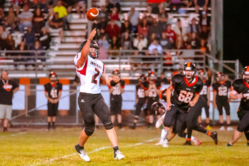Toledo&rsquo;s Wyatt Nef (2) completes a pass during a game against the Mountaineers Friday night at Rainier High School.