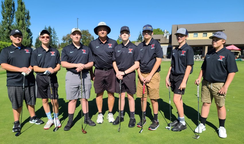 Tenino boys golf poses for a photo before their first-ever golf match on Tuesday at Tahoma Valley Golf Course in Yelm.
